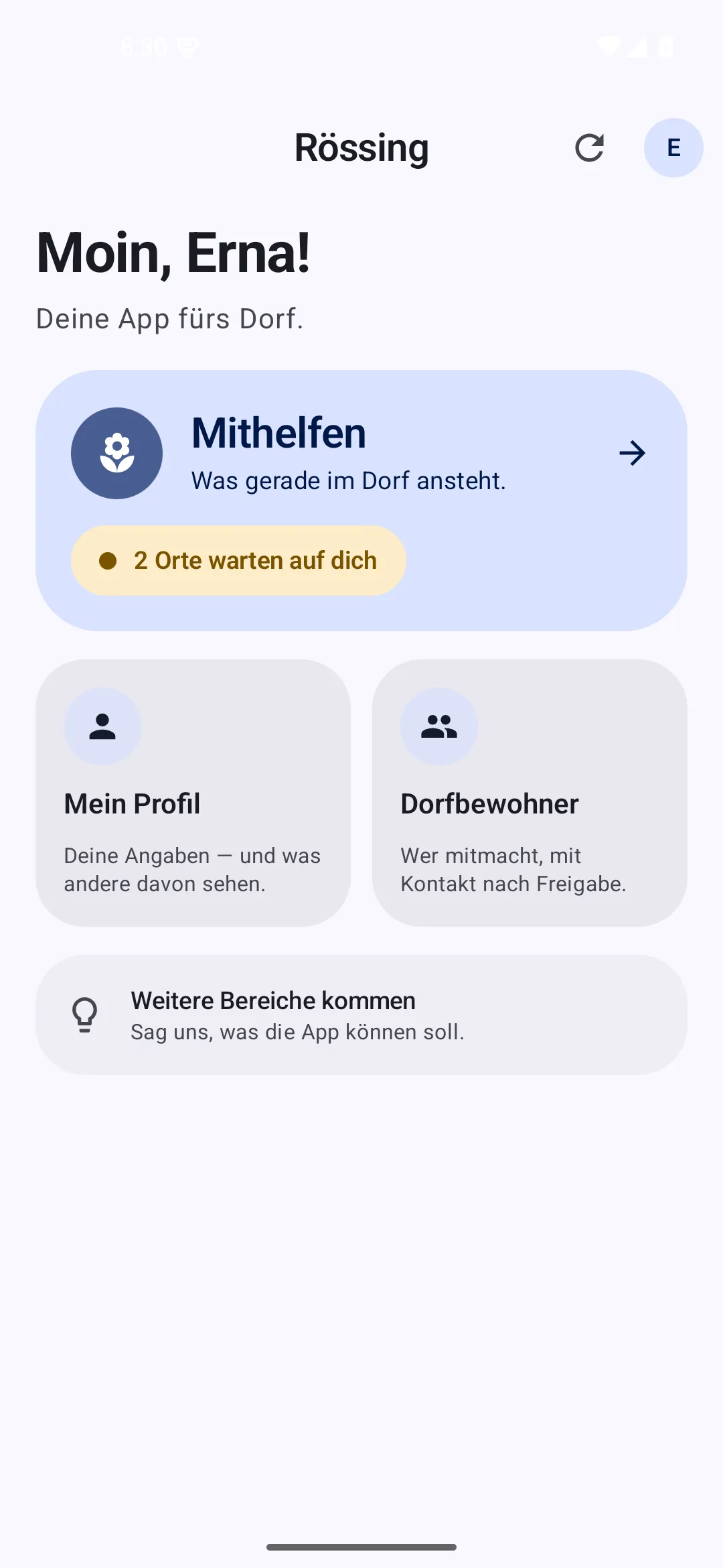 Startseite der Rössing-App mit der Begrüßung „Moin, Erna!“, der großen Kachel „Mithelfen – Was gerade im Dorf ansteht“ mit dem Hinweis „2 Orte warten auf dich“ sowie den Kacheln „Mein Profil“ und „Dorfbewohner“.